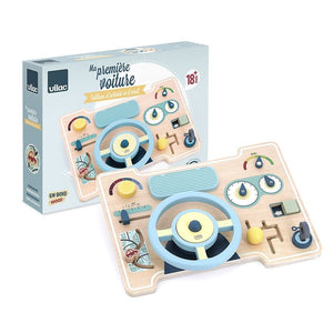 Activity_board_Palubná_doska_s_volantom_pri_škatuli