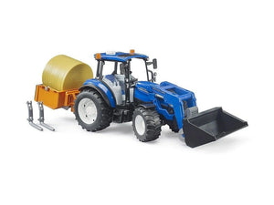 Bruder_Traktor_New_Holland_T5.120_s čelným_nakladačom_korbou_vidlami_a okrúhlym_balíkom