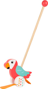 Farebný papagáj s paličkou na tlačenie