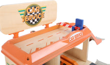 Drevená autoopravovňa s čerpacou stanicou