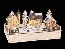 Drevená zimná dedinka s osvetlením