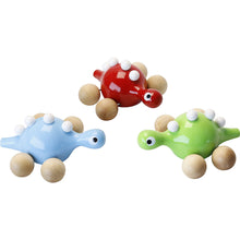 Drevený dinosaurus na kolieskach zelený 4