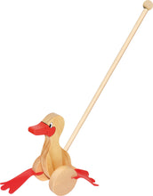 Drevená kačička s paličkou na tlačenie