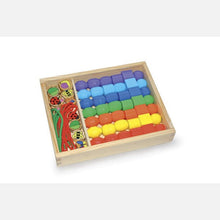 Farebné drevené korálky v drevenej kazete