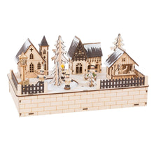 Drevená zimná dedinka s osvetlením