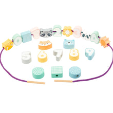 Hra navliekanie zvieratká a čísla